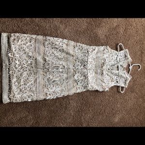 Whit lace high neck dress. Knee length